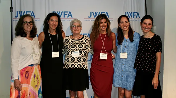 apply-grants JWFA members at an event